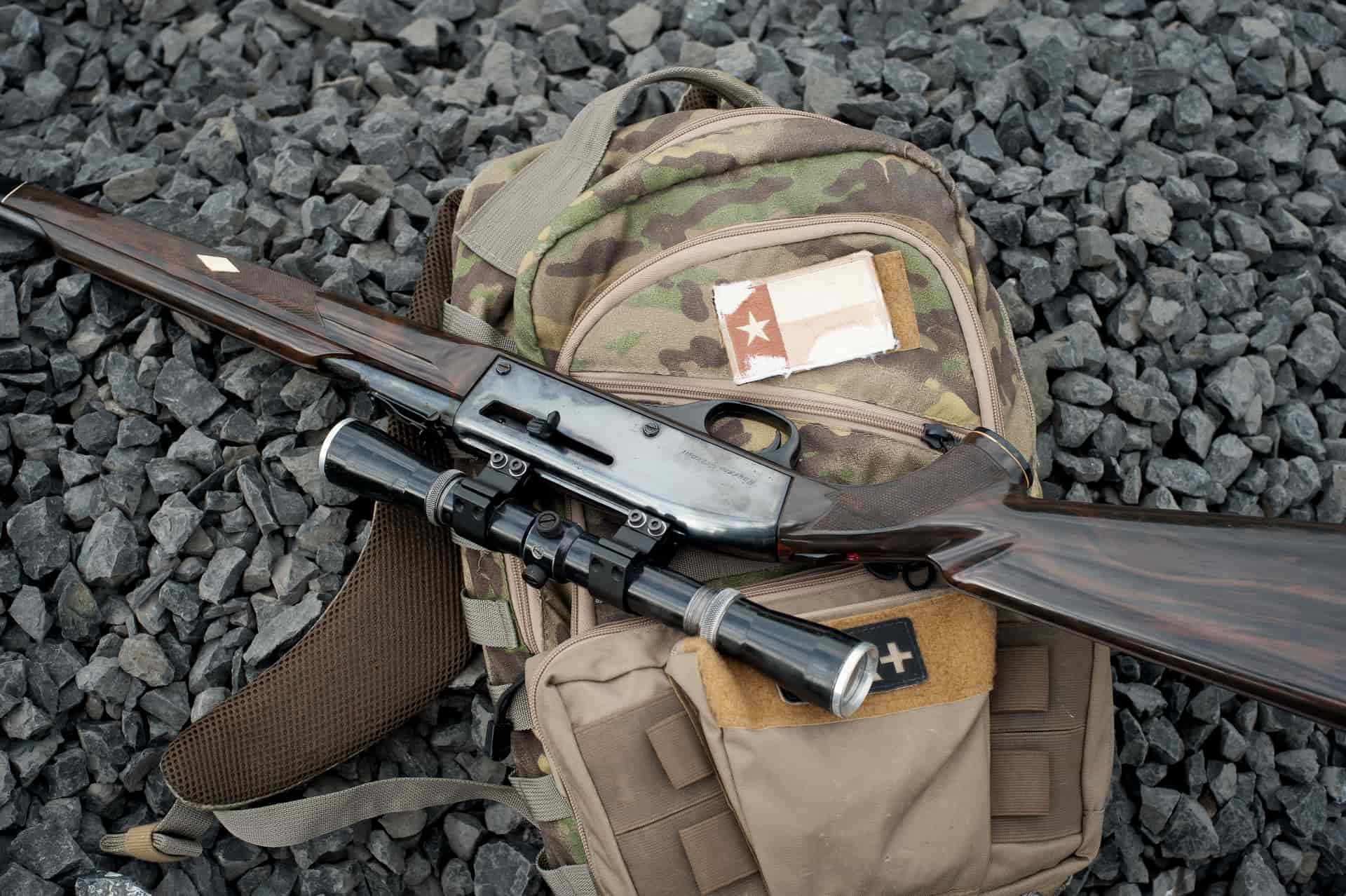 Hunting pack and gear laid out on a tailgate